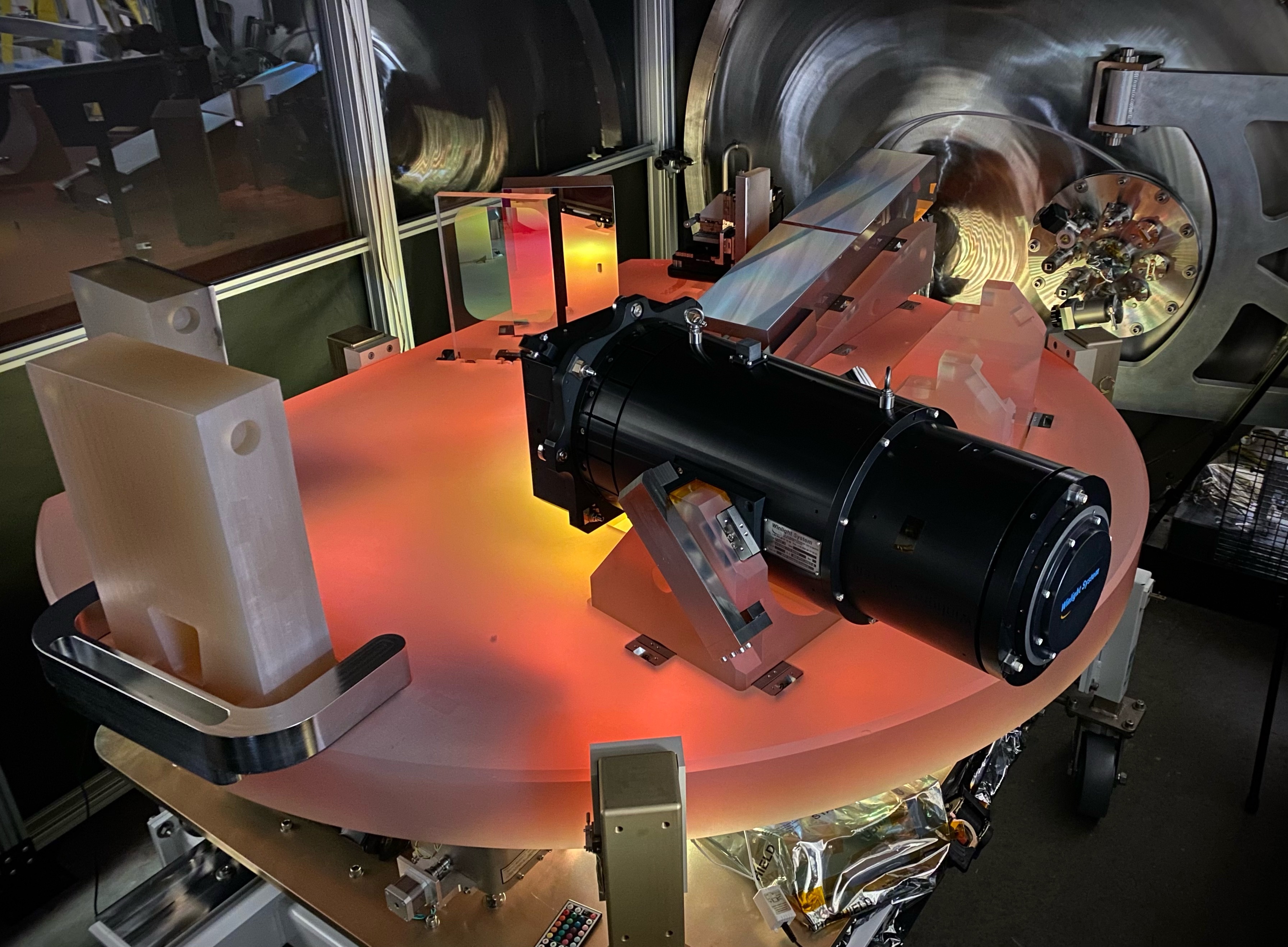 KPF's Zerodur optical bench during integration at the Space Sciences Lab at UC Berkeley. The echelle grating can be seen at the upper right.